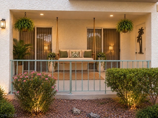 3550 Bay Sands Drive, #1017, Laughlin, NV 89029 VIRTUALLY STAGED. A sheltered ground-floor patio features recessed lighting and durable stucco finishes.
