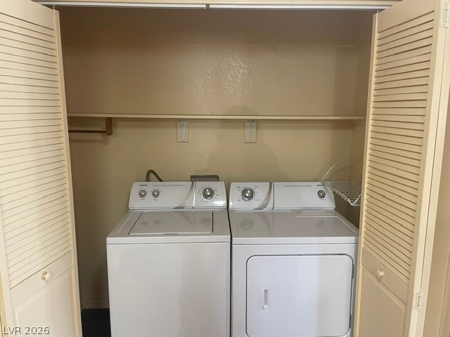 3550 Bay Sands Drive, #1017, Laughlin, NV 89029 A dedicated laundry closet includes built-in shelving over the washer and dryer units.