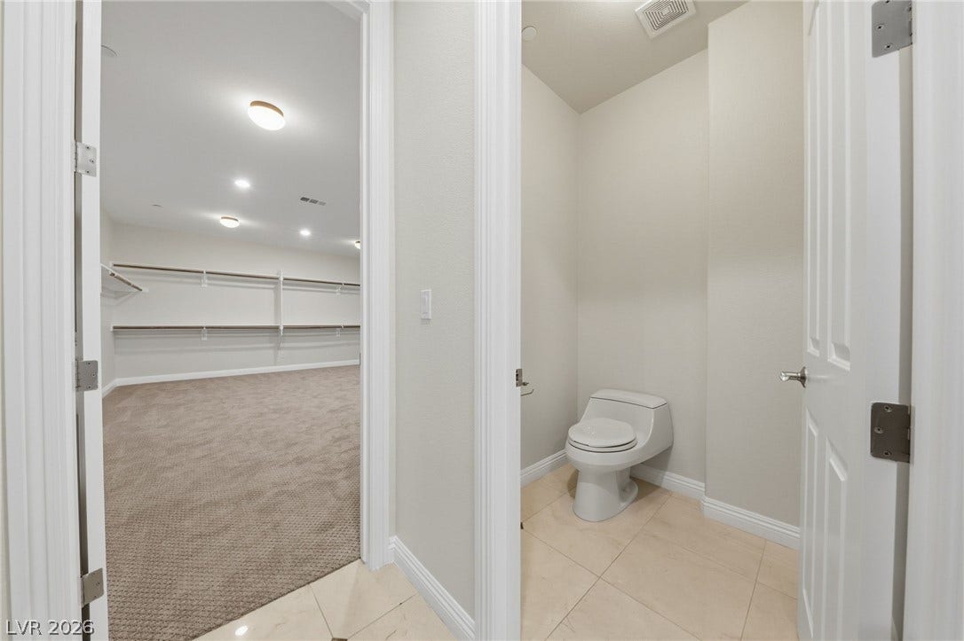 1357 Enchanted River Drive, Henderson, NV 89012 An adjacent water closet and large closet area maximize functional spatial flow.