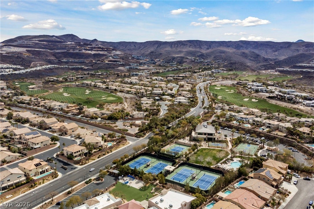 1357 Enchanted River Drive, Henderson, NV 89012 Breathtaking desert mountains frame this master-planned community featuring professional-grade tennis courts and lush golf fairways.