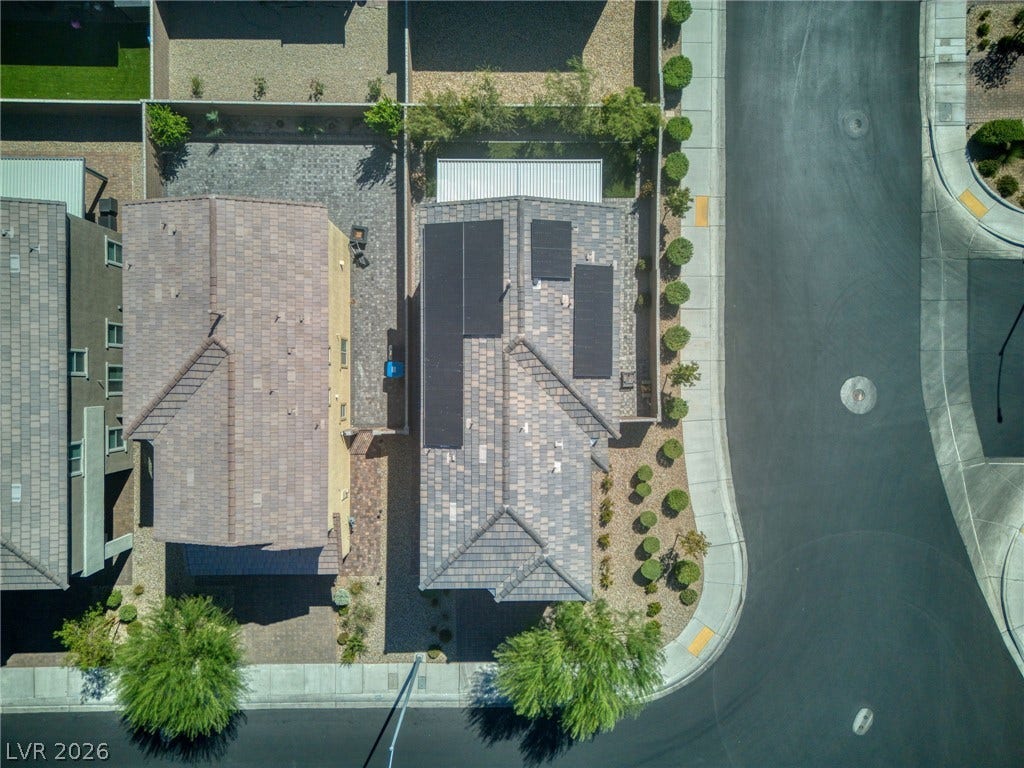 2719 High Echelon Road, North Las Vegas, NV 89086 An aerial perspective shows the modern tiled roof equipped with integrated solar panels.