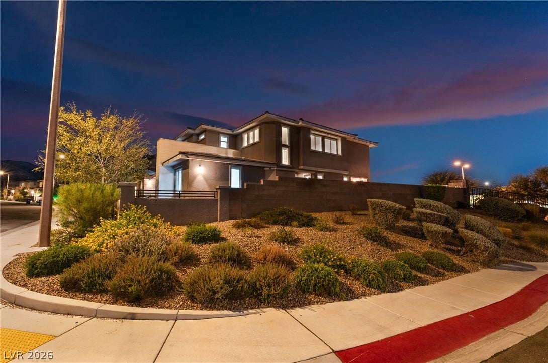 12424 Point Sierra Street, Las Vegas, NV 89138 Sleek contemporary architecture rises above beautifully landscaped grounds on a prime corner lot.