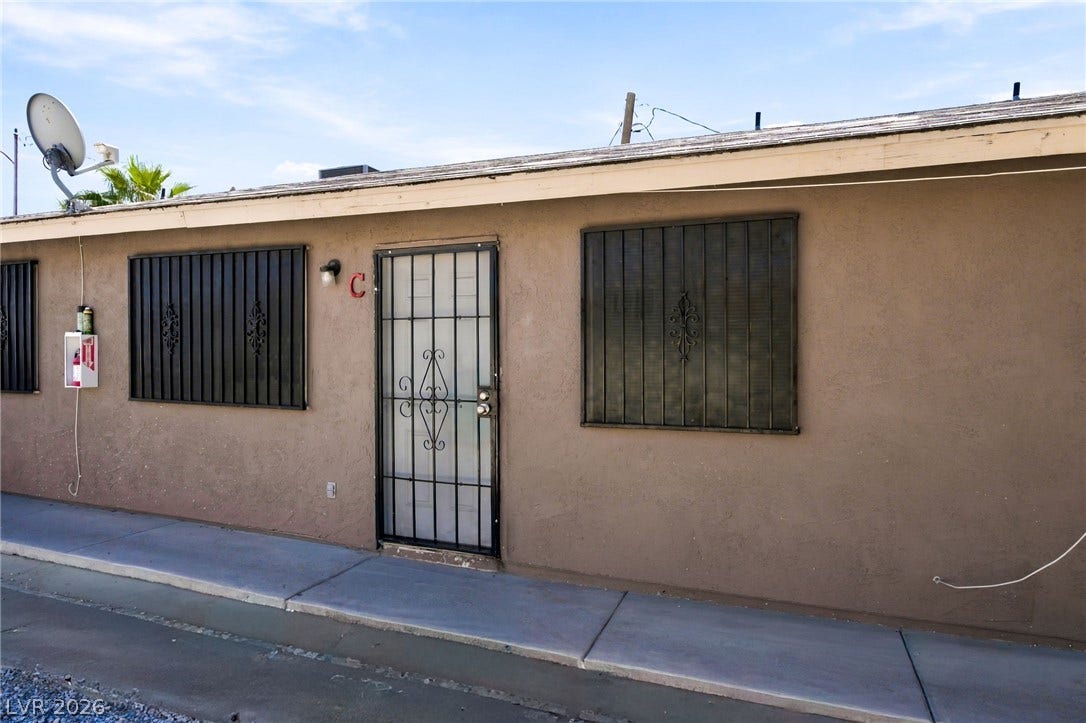 2553 Ellis Street, North Las Vegas, NV 89030 Solid stucco construction defines this low-maintenance exterior featuring secure barred windows and doors.