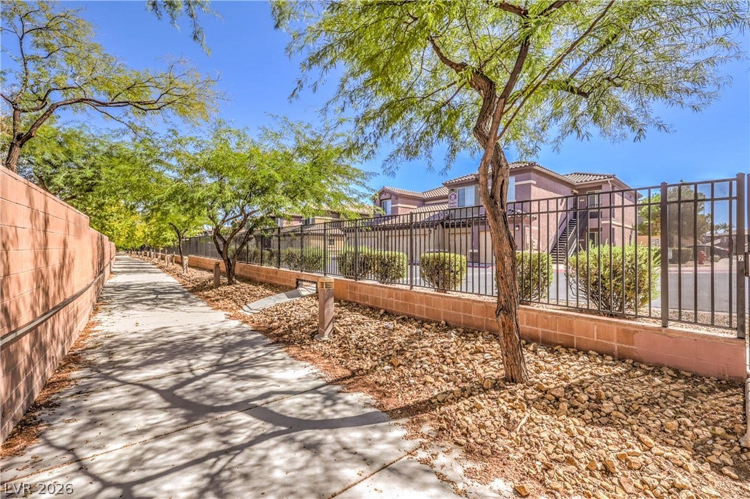 6868 Sky Pointe Drive, #1132, Las Vegas, NV 89131 Walking path that runs directly in front of the unit