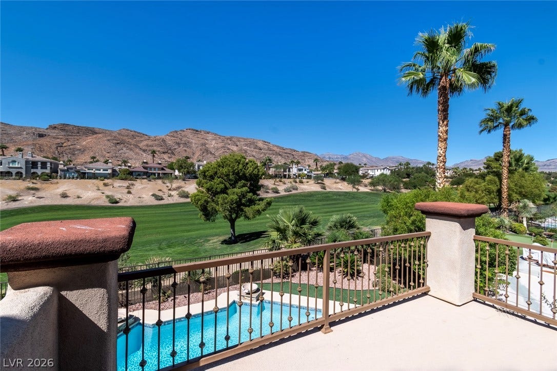 2837 Turtle Head Peak Drive, Las Vegas, NV 89135 Panoramic mountain and golf course views unfold from this elevated balcony.