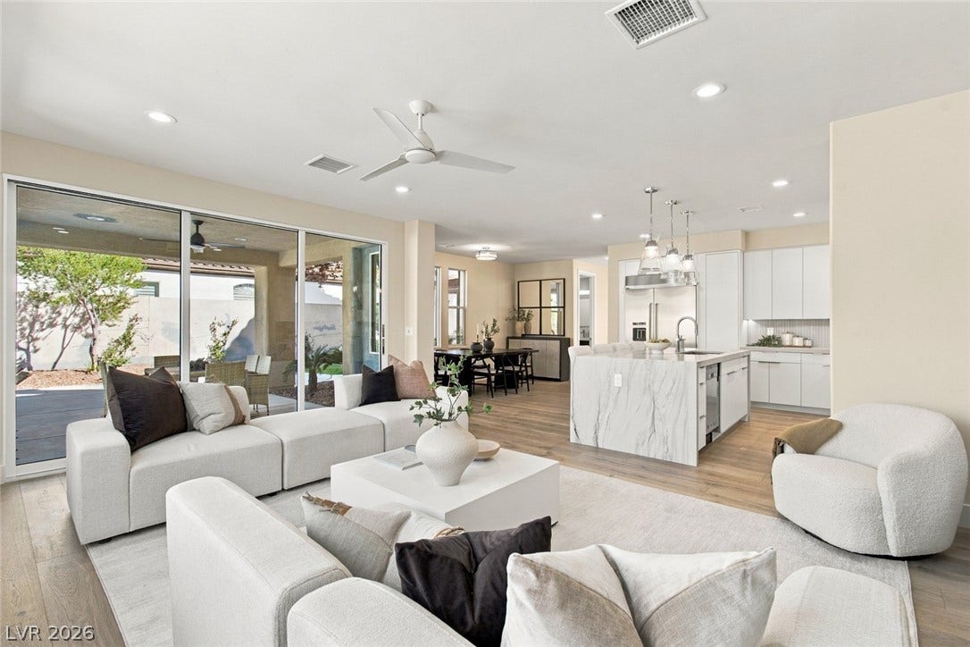 2837 Turtle Head Peak Drive, Las Vegas, NV 89135 Sliding glass doors open from the main living space to an outdoor patio.