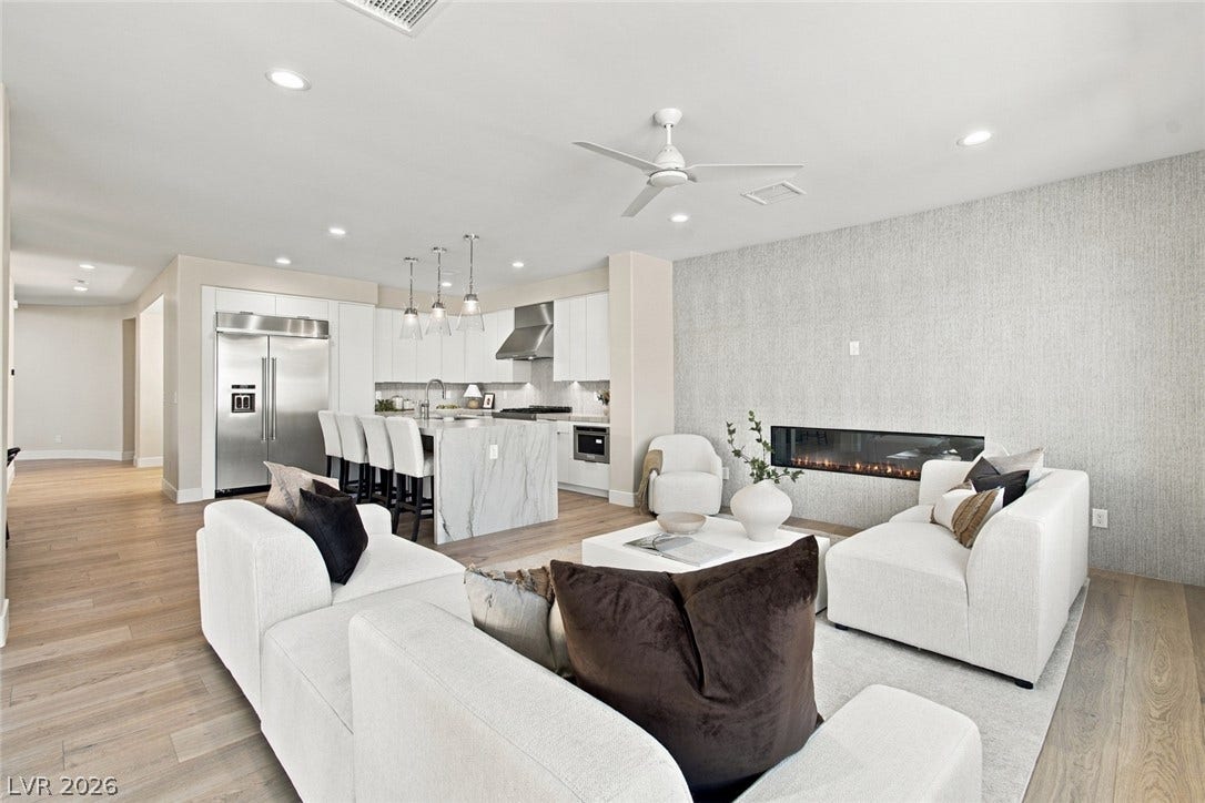 2837 Turtle Head Peak Drive, Las Vegas, NV 89135 An open floor plan connects the living area to a modern kitchen with high-end finishes.