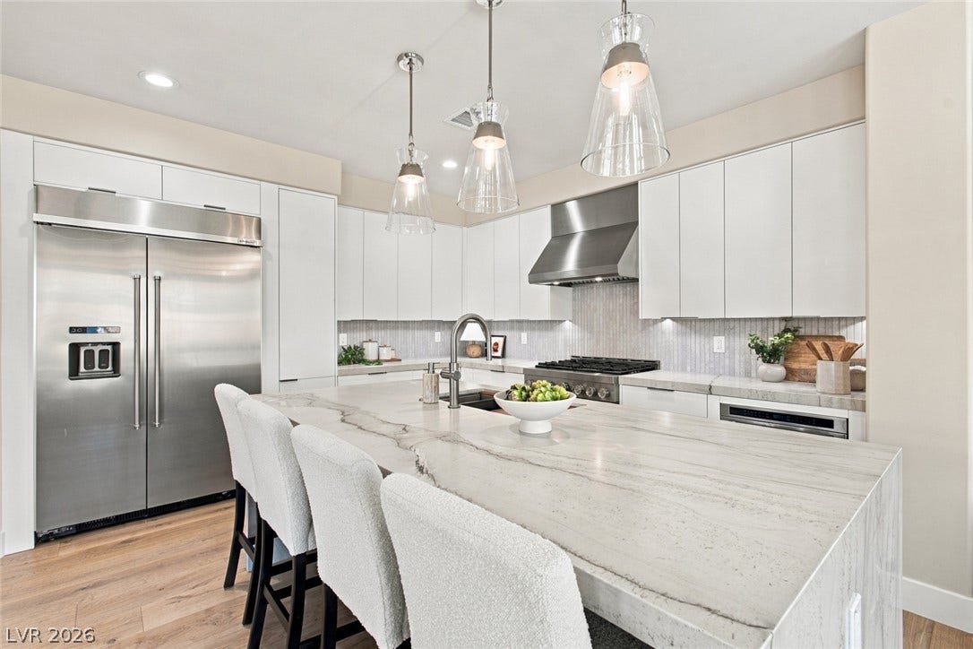 2837 Turtle Head Peak Drive, Las Vegas, NV 89135 Gleaming stone countertops and modern appliances define this culinary space.