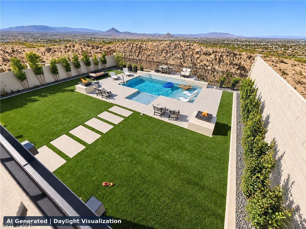270 Shaded Canyon Drive, Henderson, NV 89012 An inviting backyard oasis features a clean-lined swimming pool framed by panoramic desert mountain views.