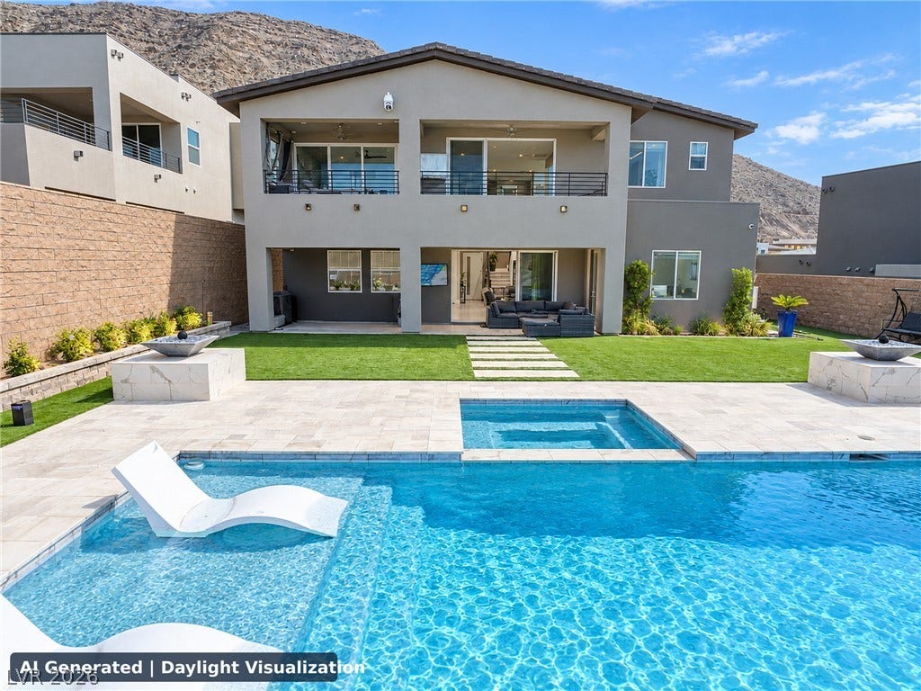 270 Shaded Canyon Drive, Henderson, NV 89012 An inviting backyard oasis features a pristine swimming pool and integrated spa.