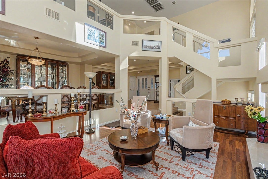 Dramatic multi-level architecture creates an impressive sense of volume in this light-filled living space.