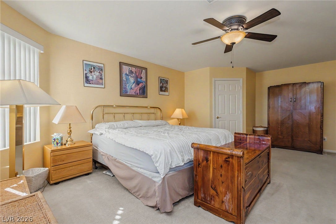 Soft carpeting pairs with warm neutral walls in this restful space.