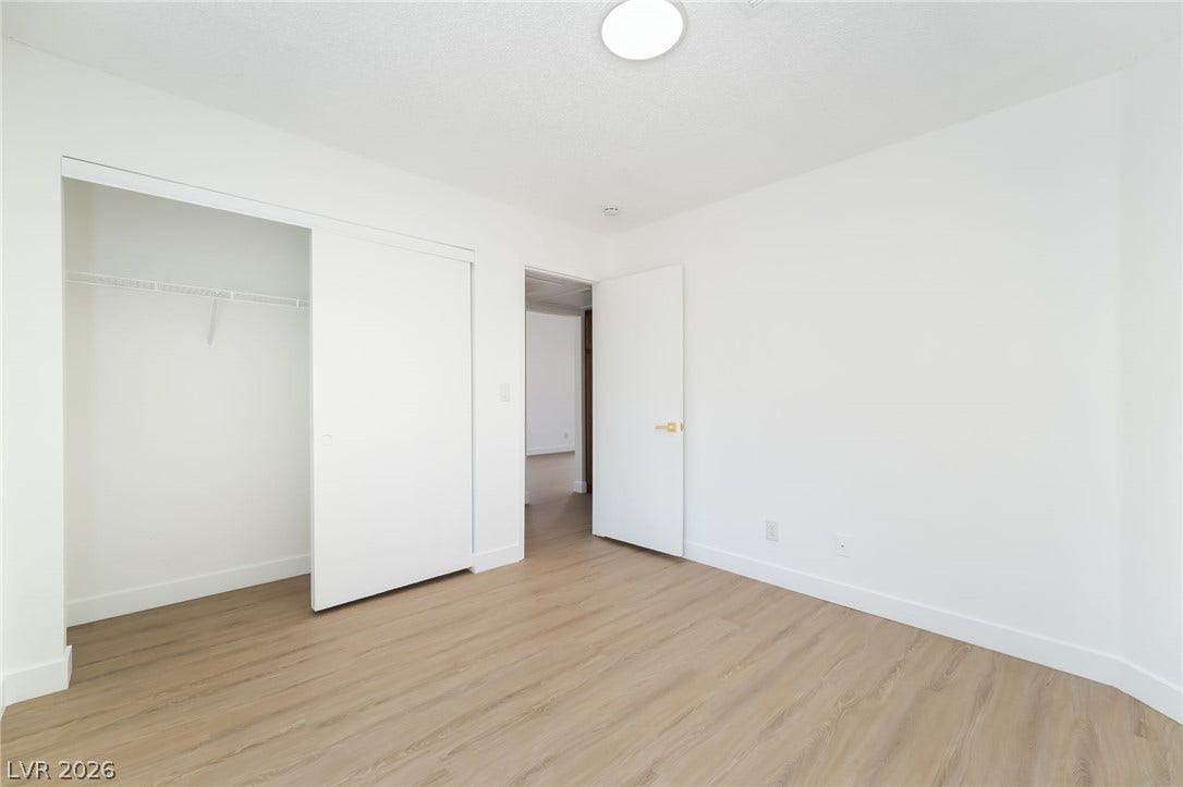 838 Anchor Drive, Henderson, NV 89015 Smooth wood-style flooring runs throughout this versatile room featuring a spacious closet.