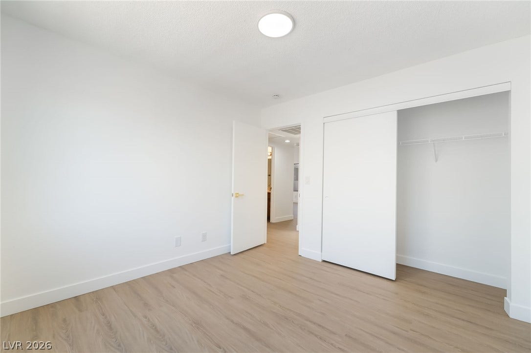 838 Anchor Drive, Henderson, NV 89015 Smooth wood-style flooring and a built-in closet define this versatile interior space.