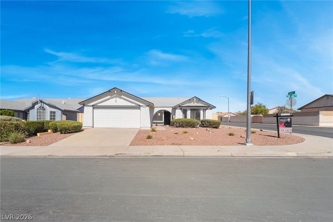 838 Anchor Drive, Henderson, NV 89015 Classic single-story architecture is highlighted by an attached garage and desert landscaping.