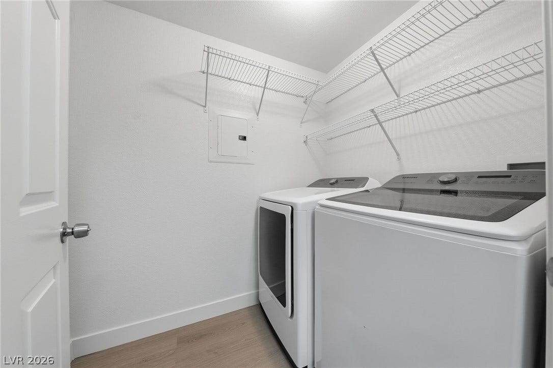 7139 S Durango Drive, #110, Las Vegas, NV 89113 Functional design defines this practical utility space featuring wood-look flooring and built-in wire shelving.