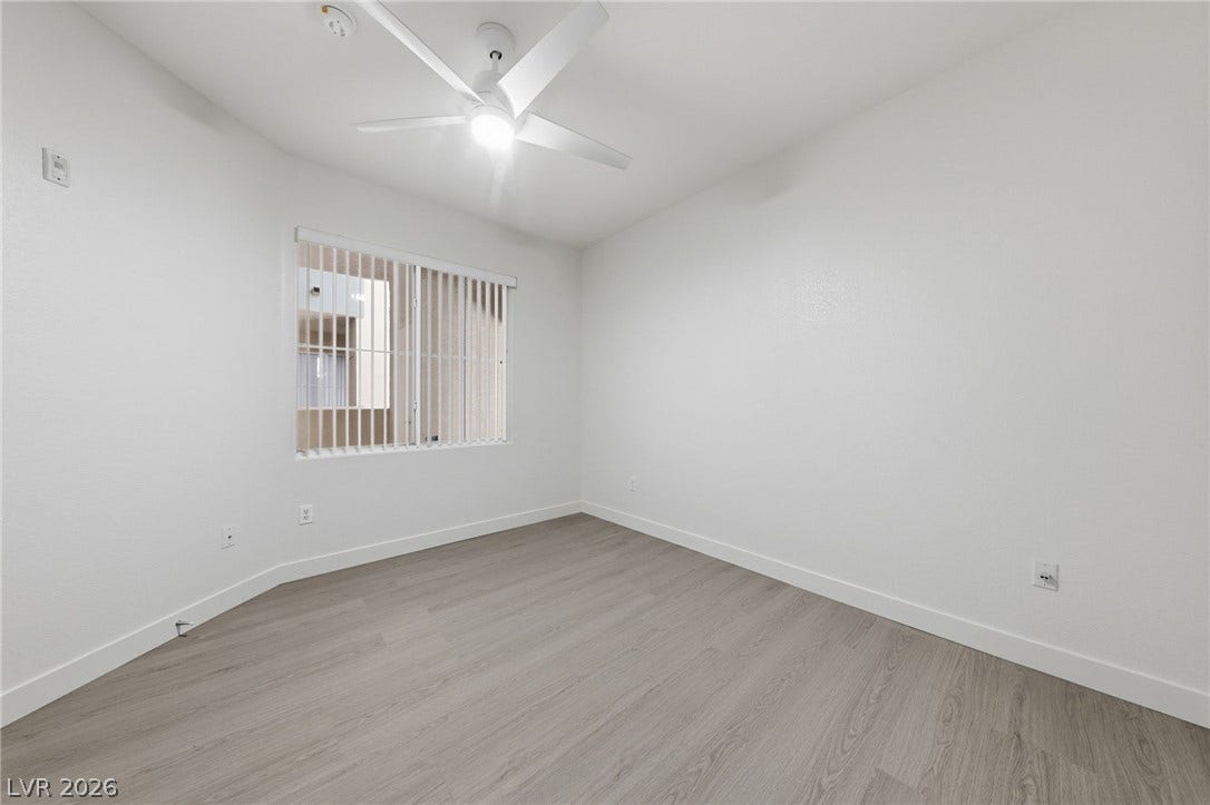 7139 S Durango Drive, #110, Las Vegas, NV 89113 Clean lines and wood-style flooring define this versatile interior space.