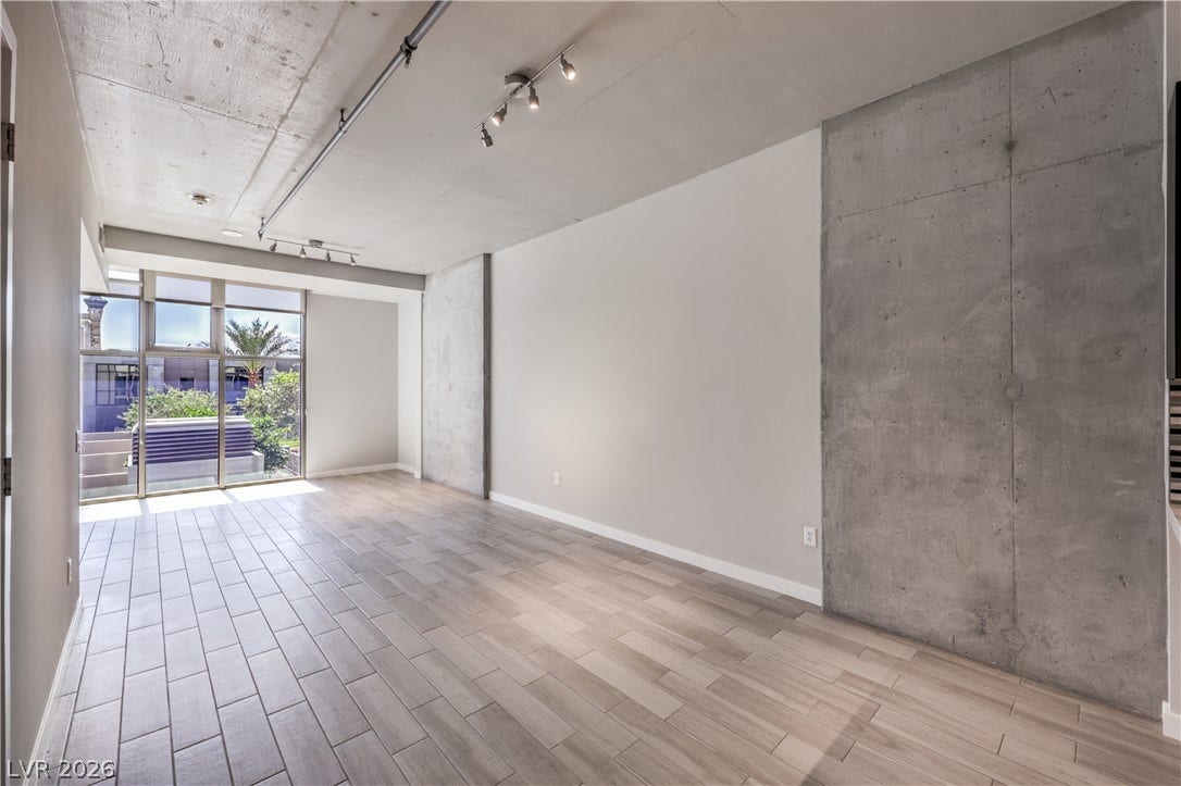 353 E Bonneville Avenue, #754, Las Vegas, NV 89101 Open Concept Great Room/Dining Room with Floor to Ceiling Windows