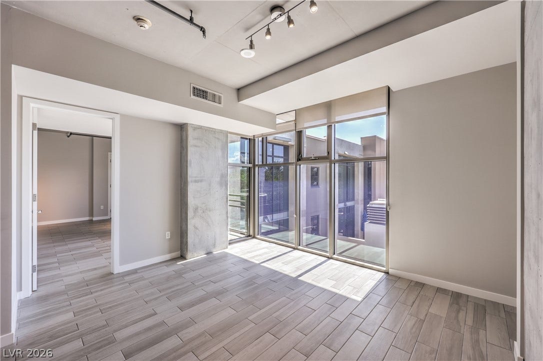 353 E Bonneville Avenue, #754, Las Vegas, NV 89101 Open Concept Great Room/Dining Room with Floor to Ceiling Windows