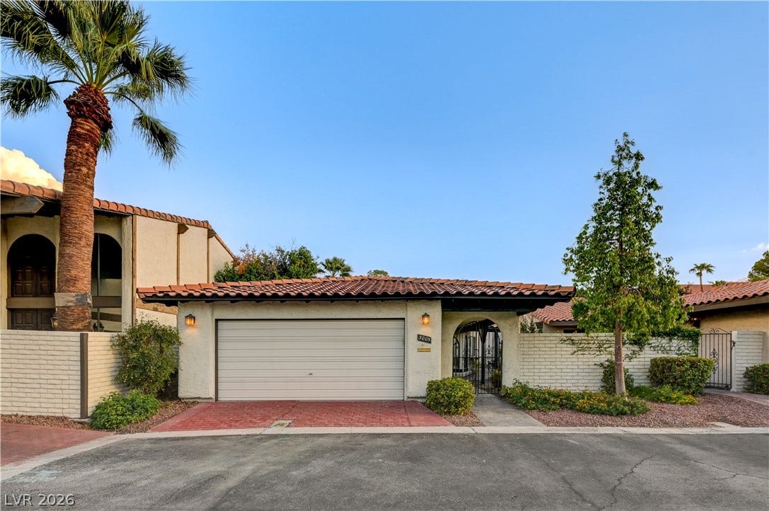 3005 Plaza De Rosa, Las Vegas, NV 89102 A classic tile roof and integrated garage define this exterior entrance facade.