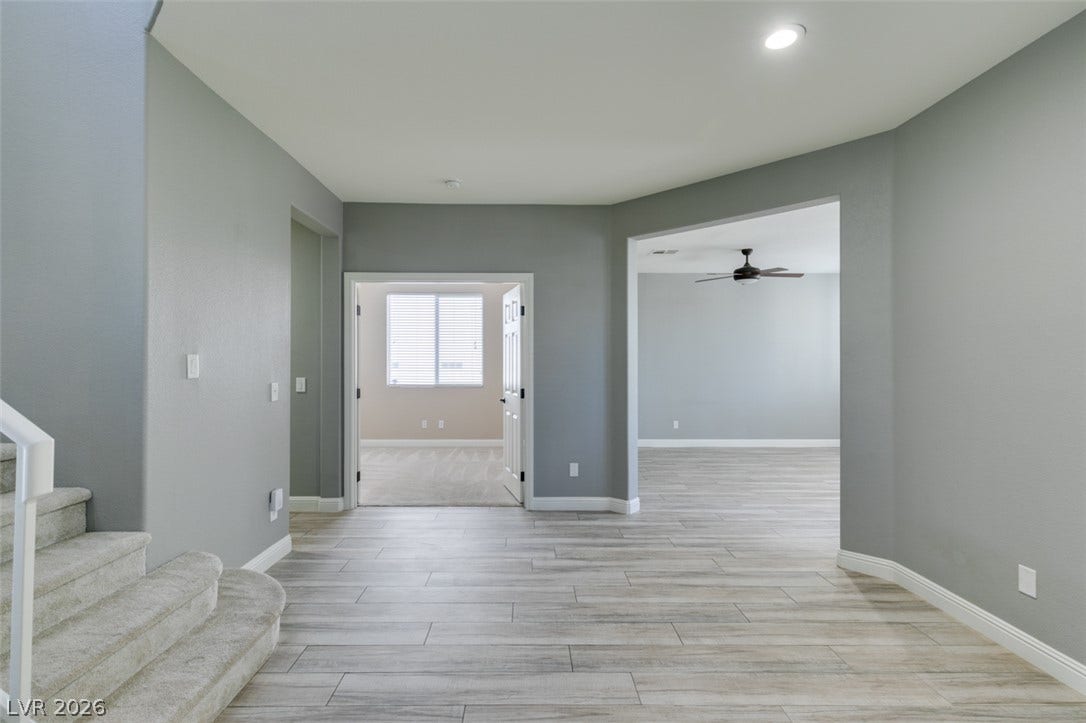 Gleaming plank flooring and an open layout create a seamless flow through the main level.