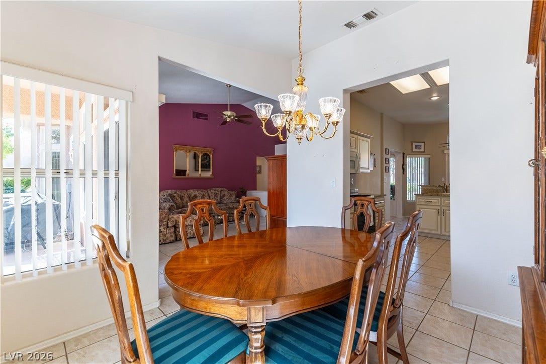 10005 Arbuckle Drive, Las Vegas, NV 89134 An open dining area transitions smoothly into neighboring living and kitchen spaces.