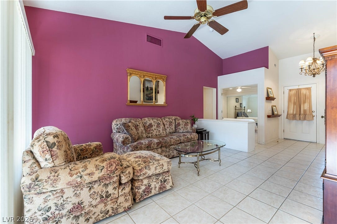 10005 Arbuckle Drive, Las Vegas, NV 89134 Vaulted ceilings and tile flooring enhance this open-concept living area.