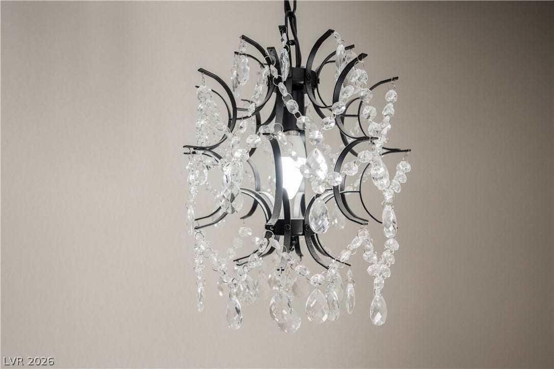 601 Sandy Drive, Henderson, NV 89002 An elegant crystal chandelier provides delicate overhead illumination.