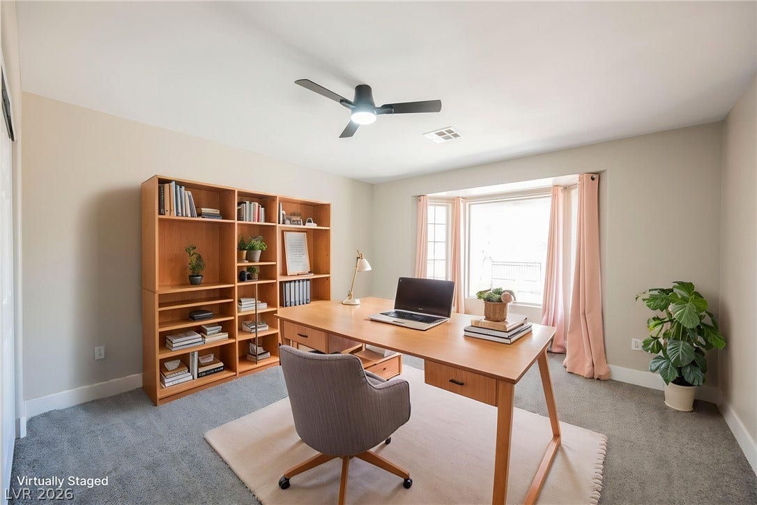 601 Sandy Drive, Henderson, NV 89002 Natural light floods this versatile space through a wide bay window.