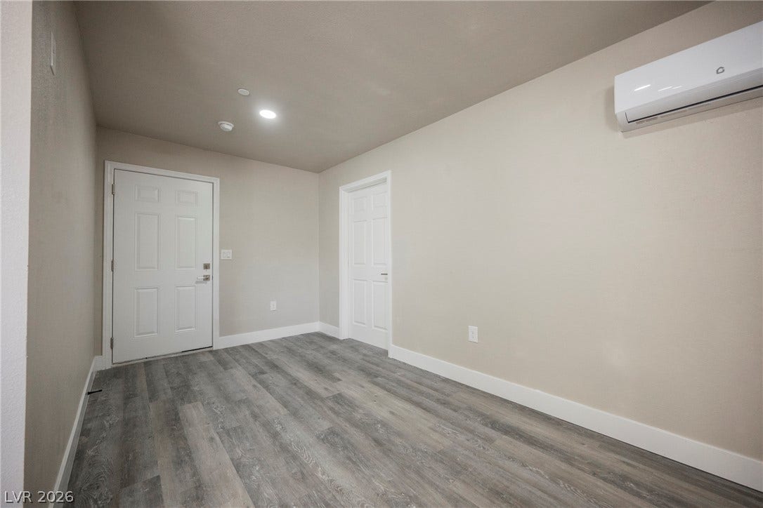 601 Sandy Drive, Henderson, NV 89002 Durable plank flooring and neutral walls define this versatile entryway space.