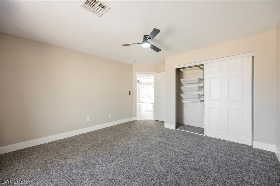 601 Sandy Drive, Henderson, NV 89002 Plush wall-to-wall carpeting and a spacious built-in closet define this versatile bedroom.
