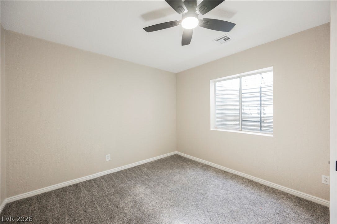 601 Sandy Drive, Henderson, NV 89002 Plush wall-to-wall carpeting and neutral tones define this versatile, quiet bedroom retreat.