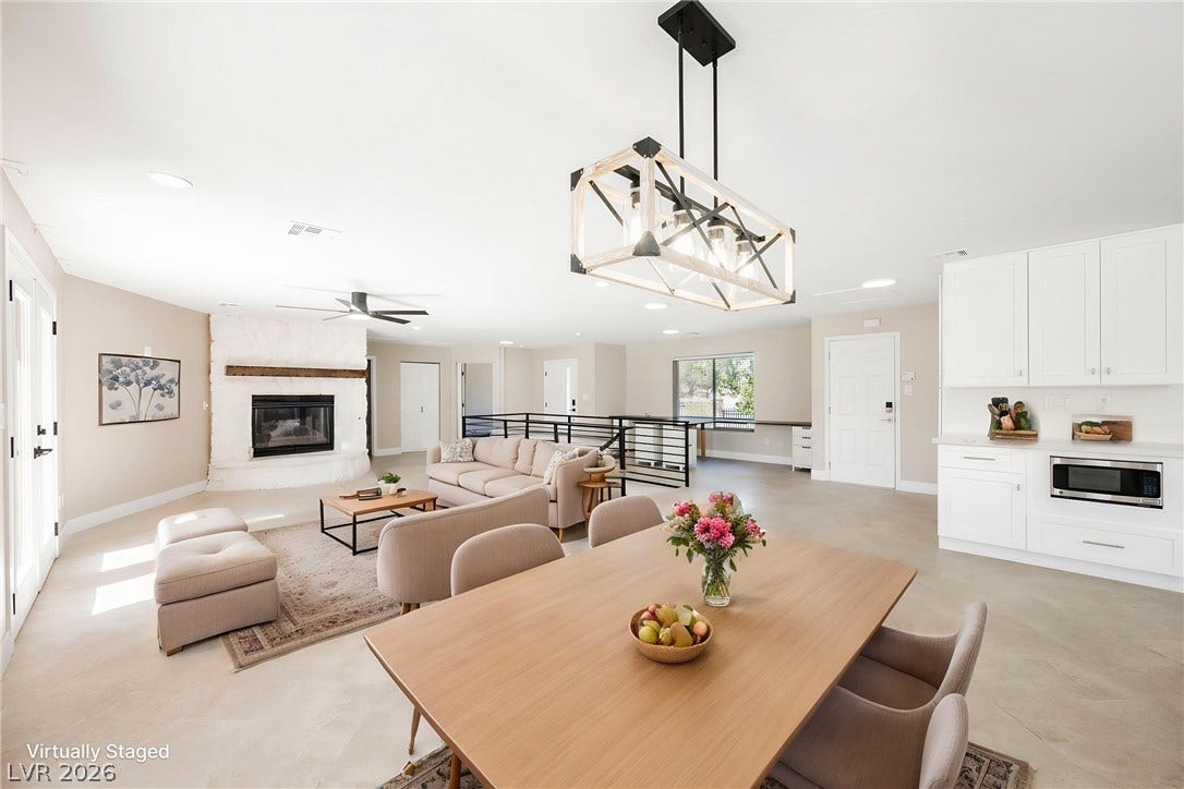 601 Sandy Drive, Henderson, NV 89002 An open floor plan connects the living and dining areas under smooth plaster ceilings.