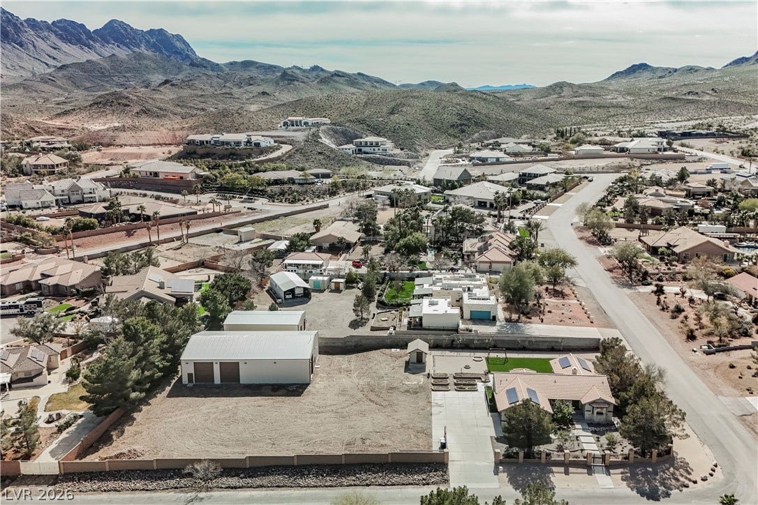 601 Sandy Drive, Henderson, NV 89002 Dramatic mountain ridges frame this expansive neighborhood backdrop.