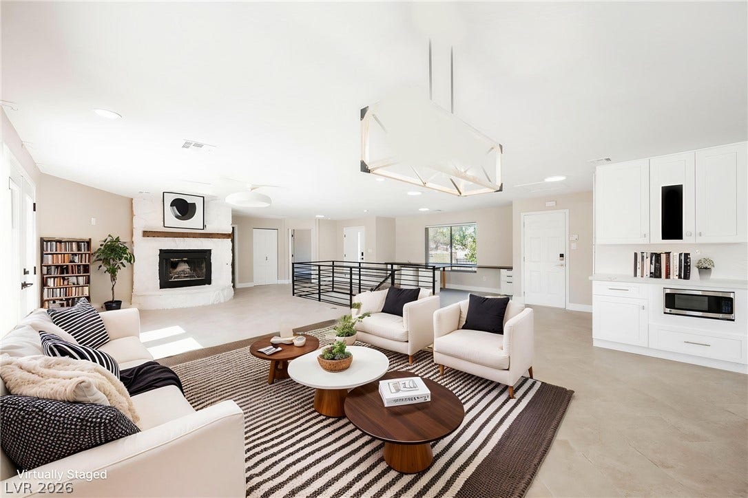 601 Sandy Drive, Henderson, NV 89002 An open floorplan seamlessly connects the fireside living space with clean architectural lines.