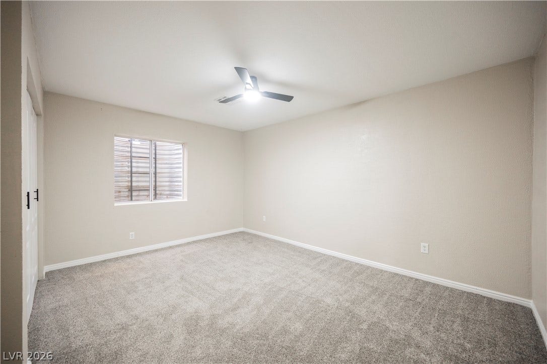 601 Sandy Drive, Henderson, NV 89002 Plush carpeting anchors this versatile room boasting clean neutral walls and a daylight egress window.