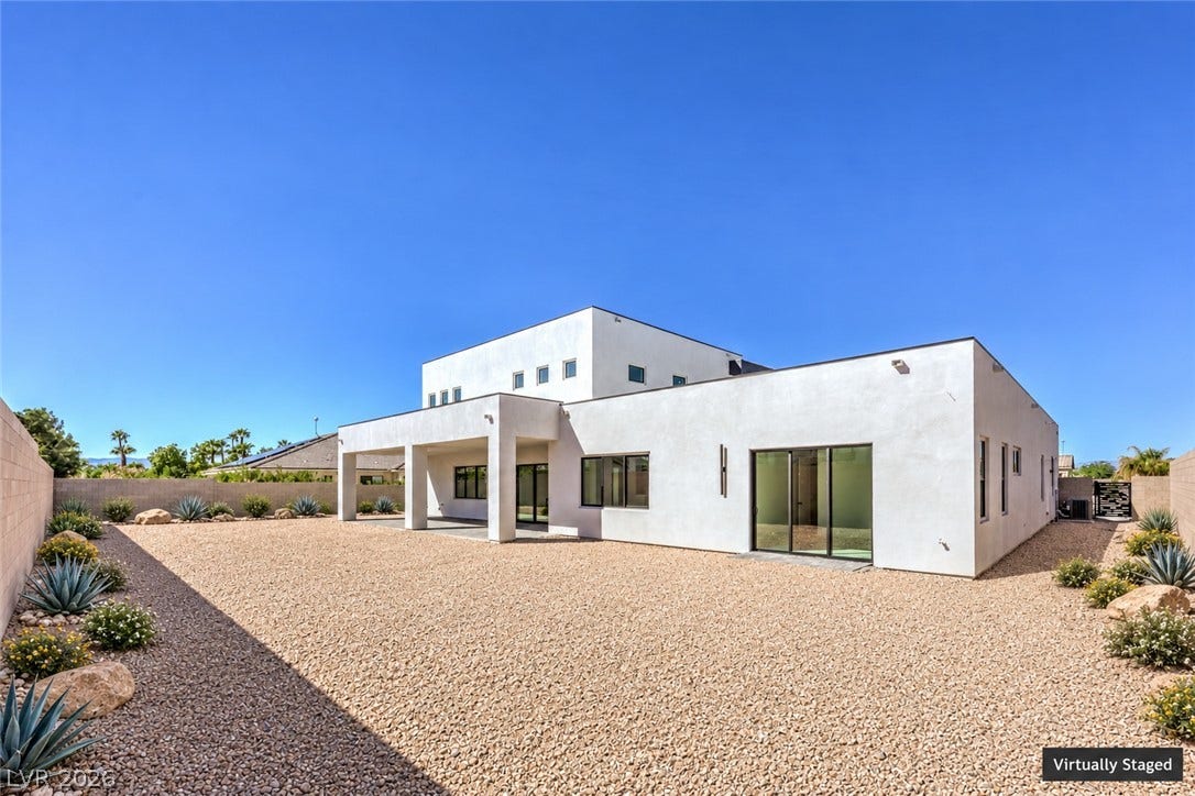 3051 E Serene Avenue, Henderson, NV 89074 Clean lines and modern design define this striking contemporary estate under vast desert skies.