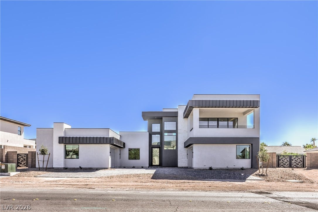 3051 E Serene Avenue, Henderson, NV 89074 Striking contemporary architecture defines this multi-level home with clean geometric lines.