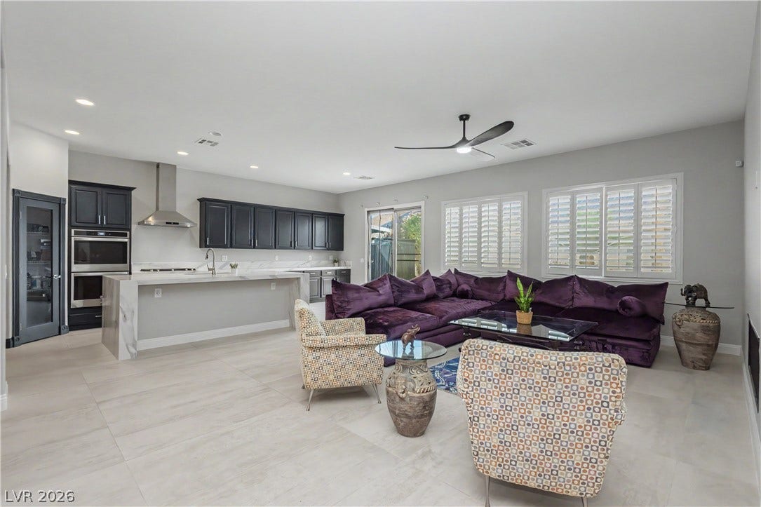 7126 Spindle Berry Street, Las Vegas, NV 89131 Seamless open floorplan integrates the gourmet kitchen with a spacious living area and tile floors.