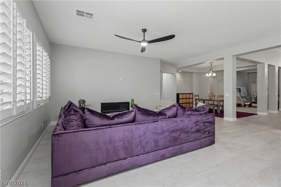 7126 Spindle Berry Street, Las Vegas, NV 89131 An open floorplan seamlessly connects the living space to the adjacent dining area.