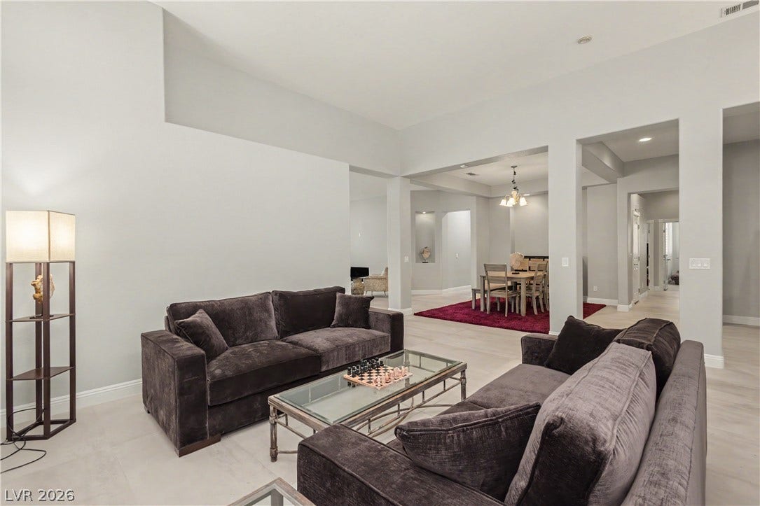 7126 Spindle Berry Street, Las Vegas, NV 89131 An open floor plan connects the main living space seamlessly to adjacent dining areas.