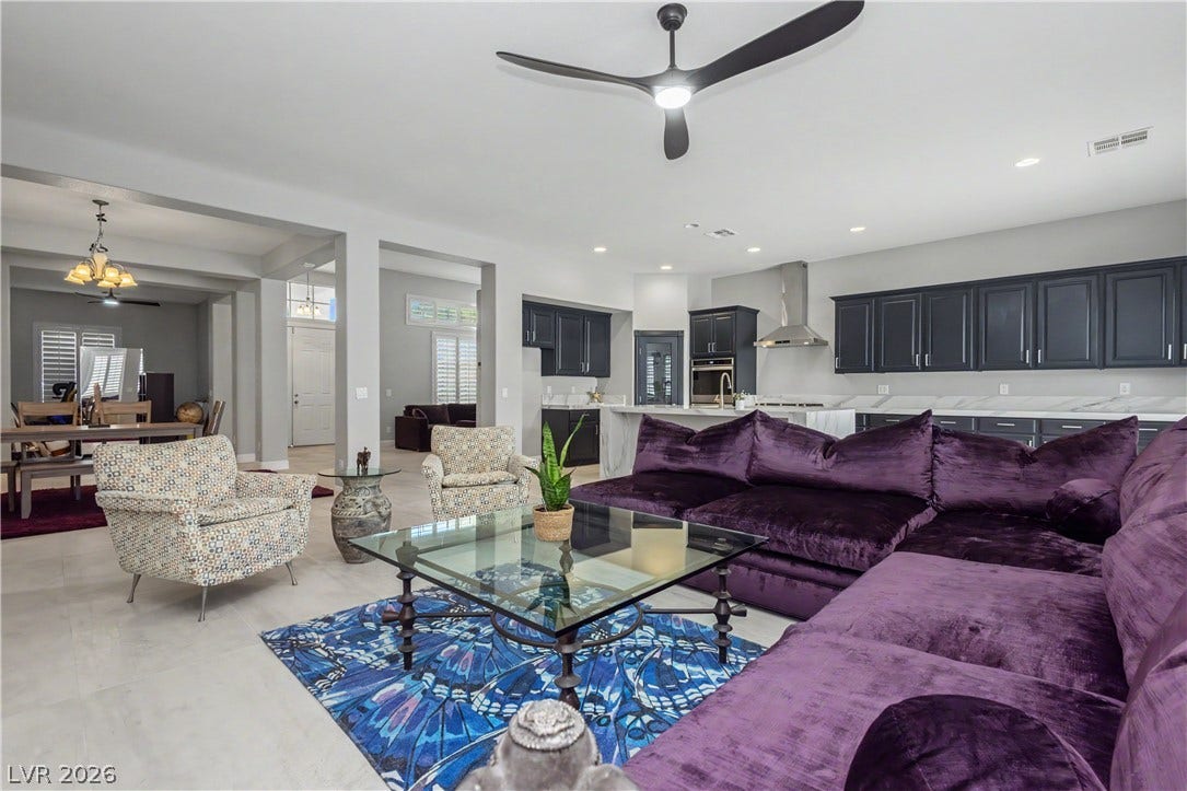7126 Spindle Berry Street, Las Vegas, NV 89131 Clean tile flooring and a seamless open floorplan connect the airy living spaces.