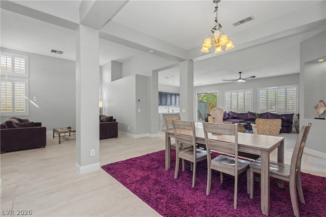 7126 Spindle Berry Street, Las Vegas, NV 89131 An open floorplan seamlessly connects the dining space to multiple living areas.