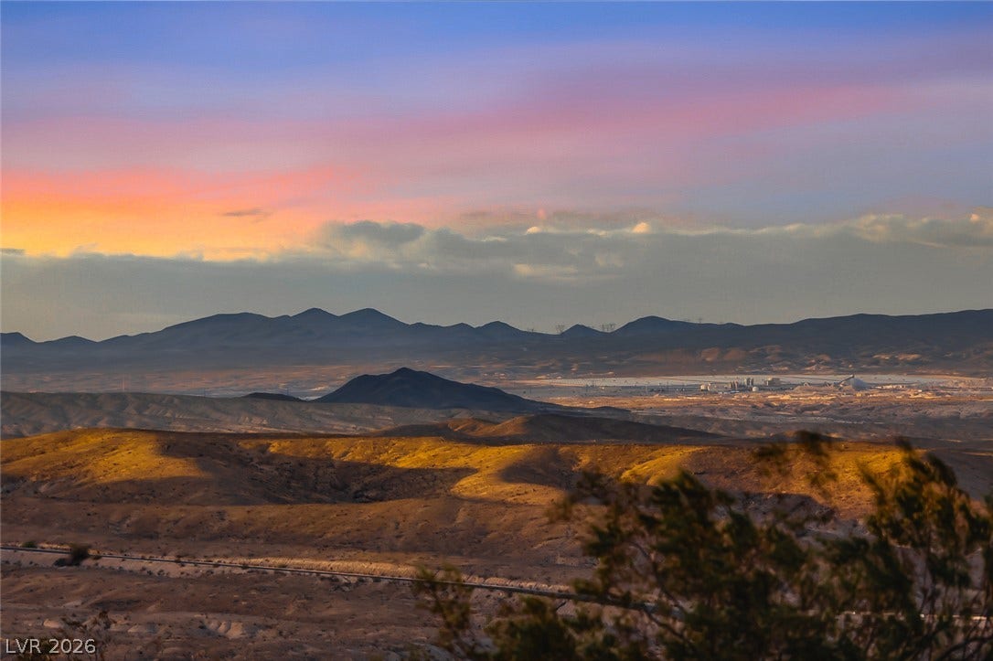 Dramatic mountain and desert vistas unfold under vibrant sunset skies.