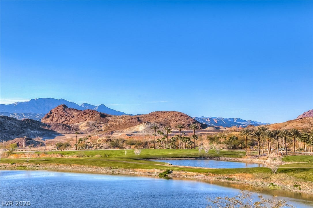 Dramatic mountain ranges and serene water features create a breathtaking backdrop.