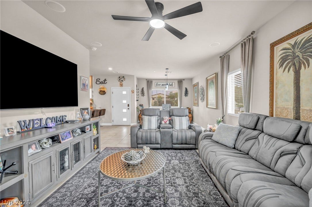 7481 Garnet Moon Street, North Las Vegas, NV 89084 An open floorplan seamlessly connects the comfortable living space to the adjacent dining area.