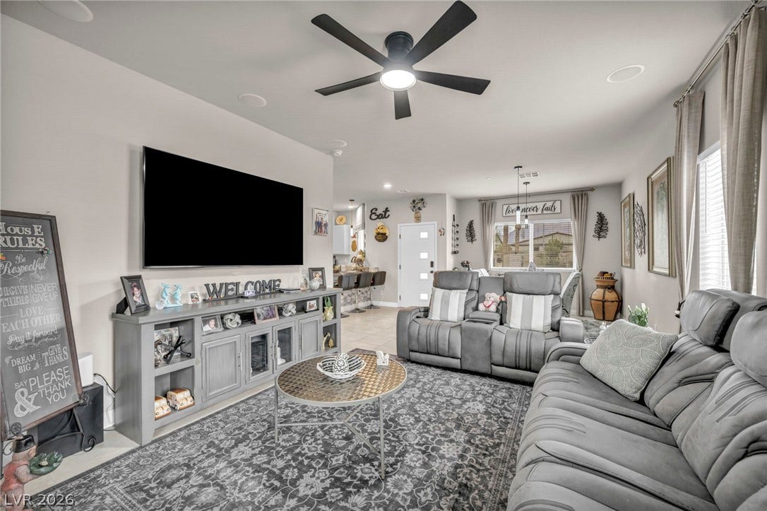 7481 Garnet Moon Street, North Las Vegas, NV 89084 An inviting open floorplan flows seamlessly from the living room to the adjacent dining area.