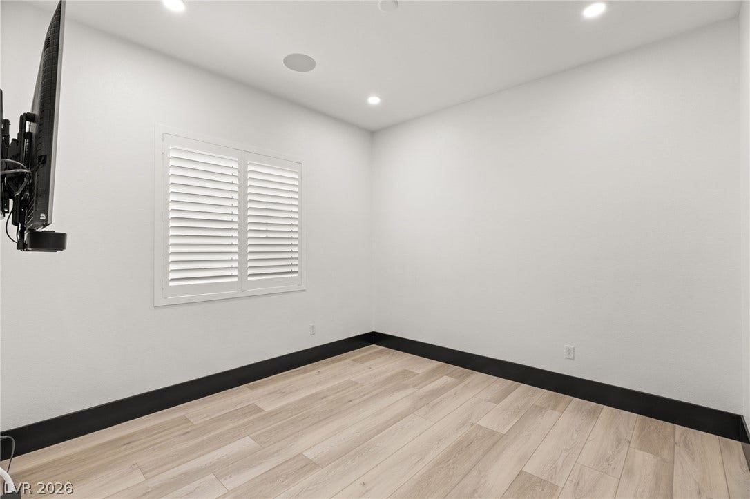 11041 Concord Valley Drive, Las Vegas, NV 89135 Clean lines and light flooring define this versatile bonus space.