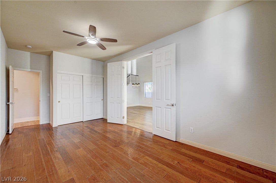 8908 Sheep Ranch Court, Las Vegas, NV 89143 Polished hardwood flooring runs throughout this versatile space featuring elegant double doors.