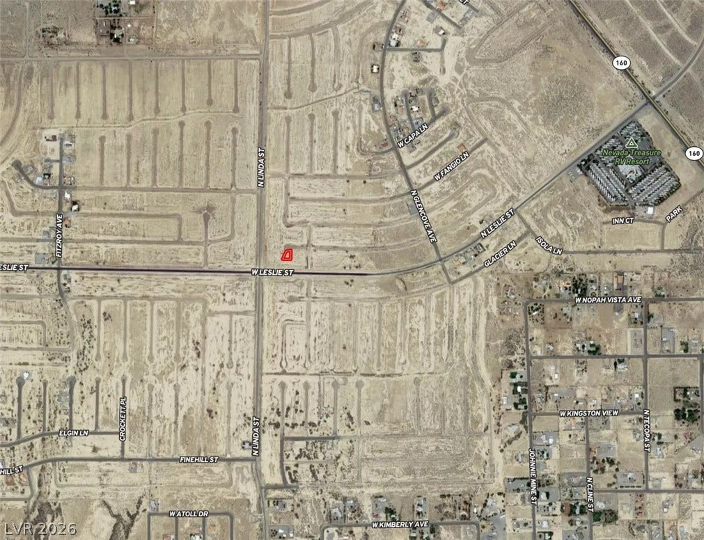 An aerial map highlights the location of this desert property within an established subdivision.